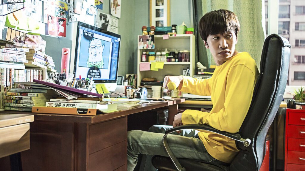 Lee Kwang Soo como Jo Seok sentado em frente ao computador no dorama The Sound of Your Heart.